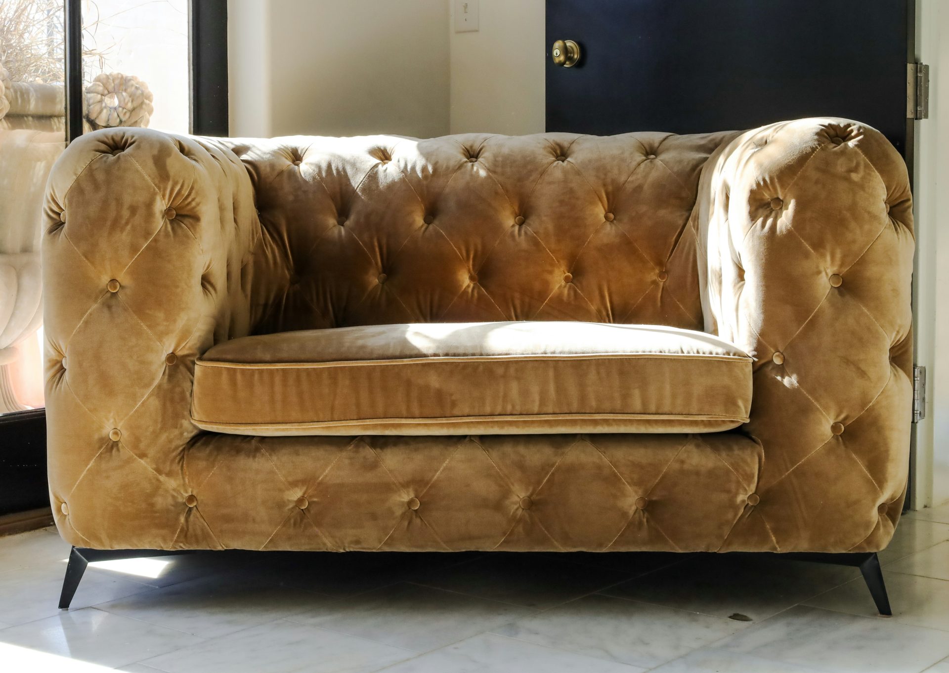 a couch with a cushion